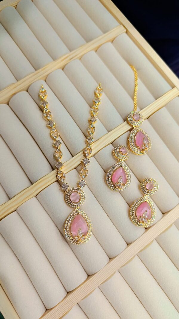 WhatsApp Image 2025-09-20 at 18.18.41_7585821a Elegant Gold-Plated Pink Stone Necklace Set with Earrings & Pendant