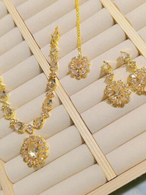 WhatsApp Image 2025-09-20 at 18.19.10_552403ae Elegant Gold-Plated Floral Necklace Set with Earrings & Pendant